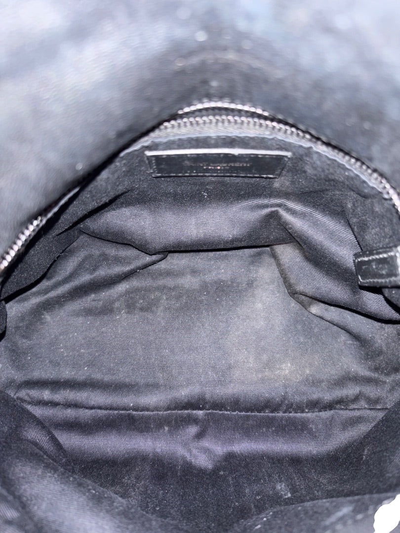 Posh Purse Co black Saint Laurent LouLou Puffer bag interior with YSL logo tag and zipper detail.
