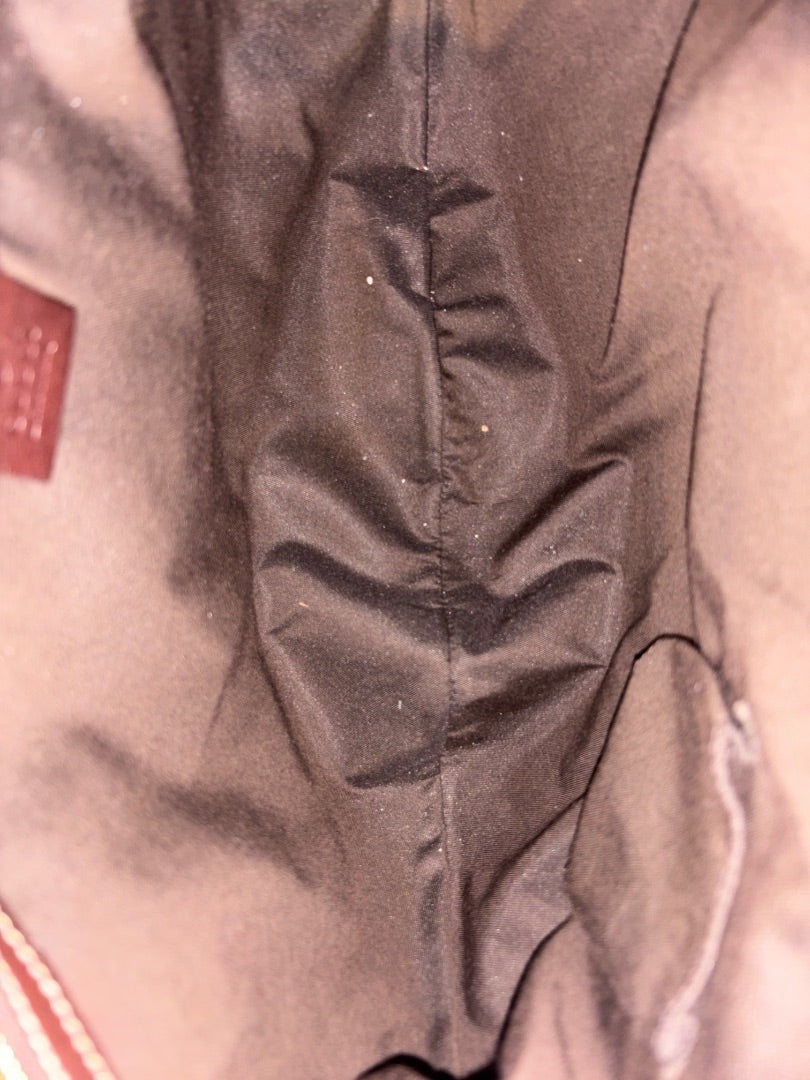 Posh Purse Co. Brown Gucci GG tote bag interior with signature monogram pattern. Spacious and luxurious.