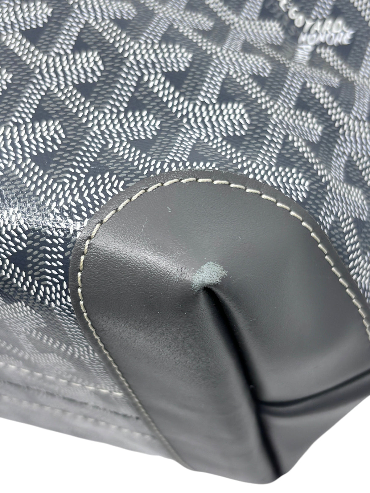 Posh Purse Co gray Goyard Bellechasse tote showing corner wear on the calfskin leather trim and Goyardine canvas