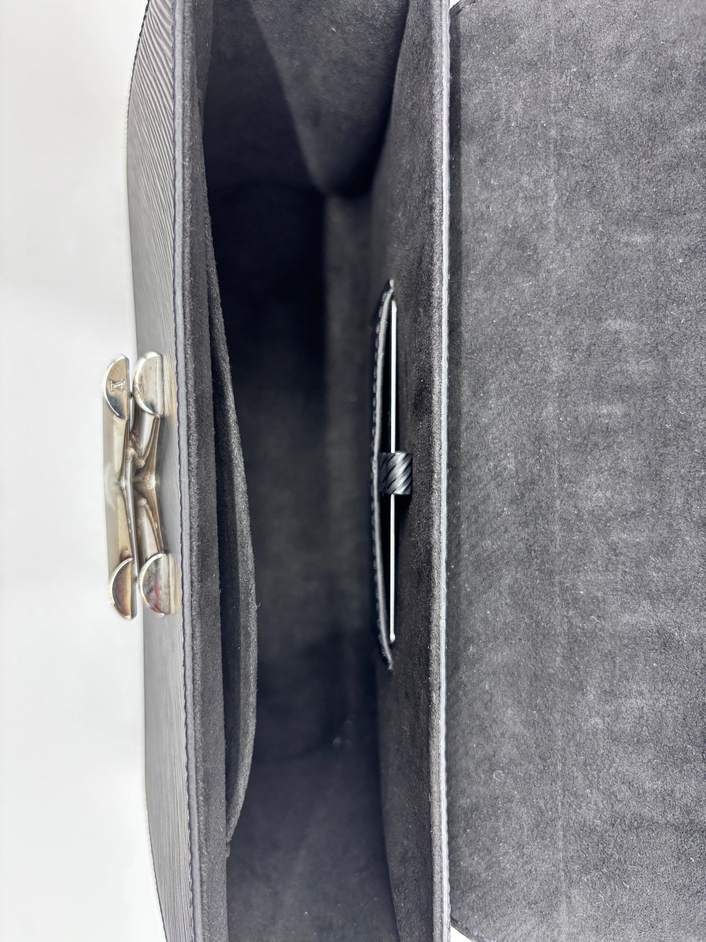 Posh Purse Co black Louis Vuitton Epi leather Twist bag interior view showing clean suede lining and hardware