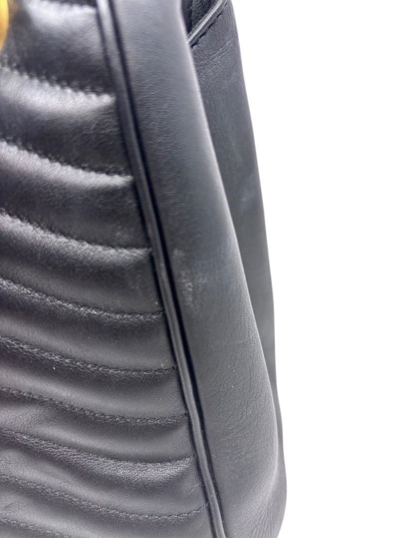 Close-up of black quilted leather side detail on a Posh Purse Co Louis Vuitton New Wave Chain Bag