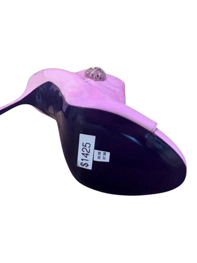 Posh Purse Co pink patent leather open-toe stiletto booties with skull embellishment and high heel.
