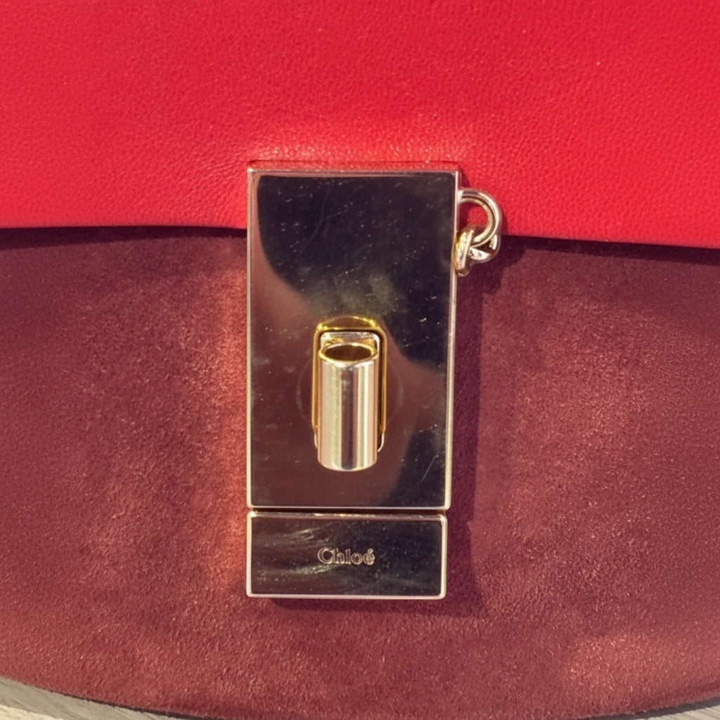 Posh Purse Co. small red leather and suede Chloe Drew bag with gold hardware and turn-lock closure.