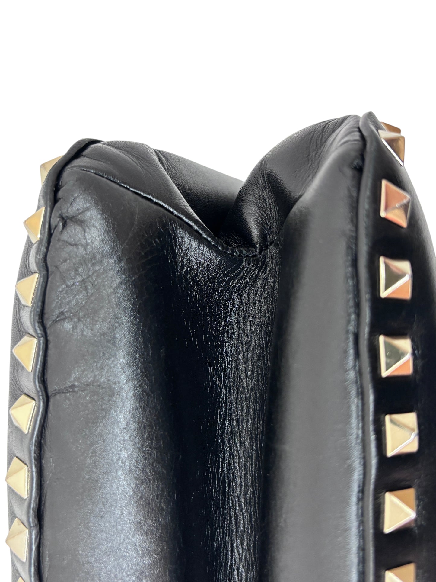 Posh Purse Co. black leather Valentino Rockstud bag featuring signature gold-tone pyramid stud detailing