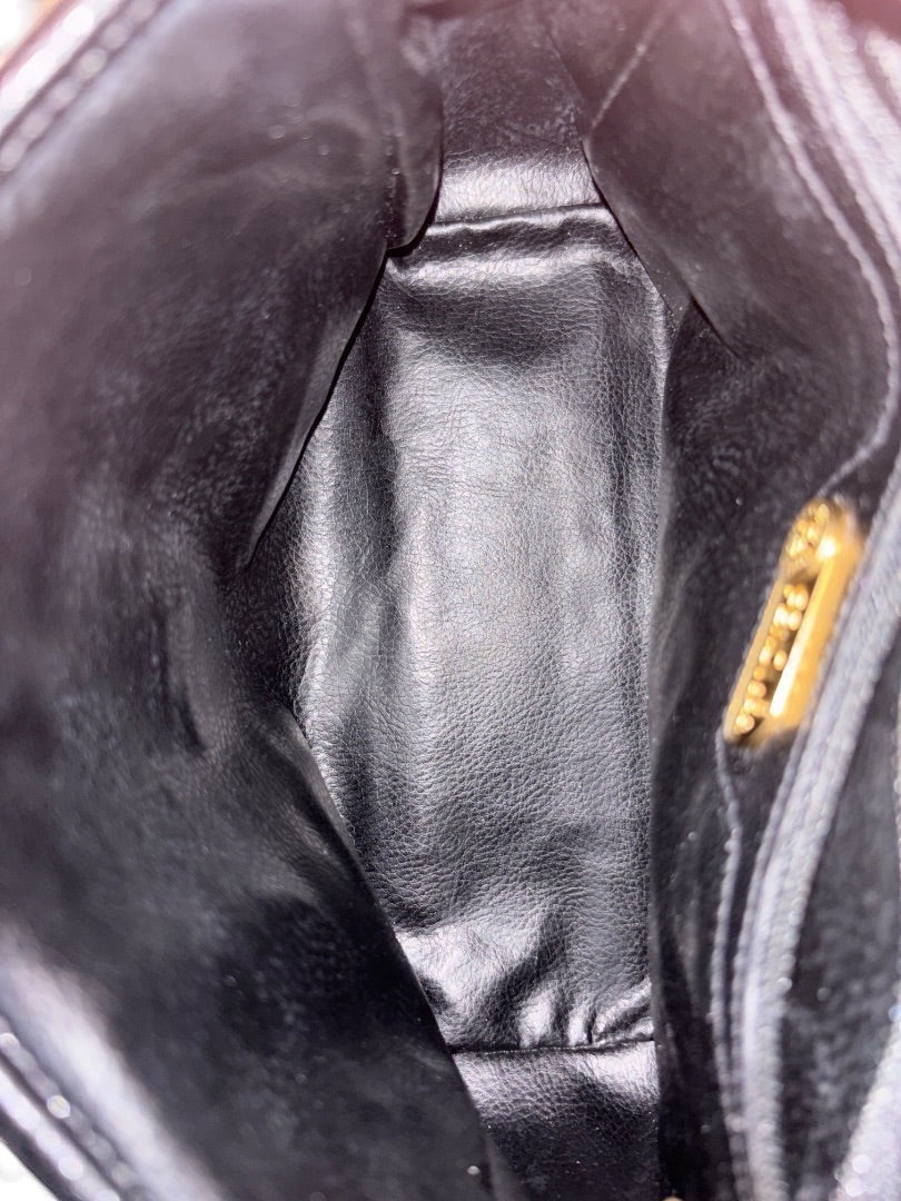 Posh Purse Co. vintage black leather Fendi crossbody bag interior with gold zipper detail.