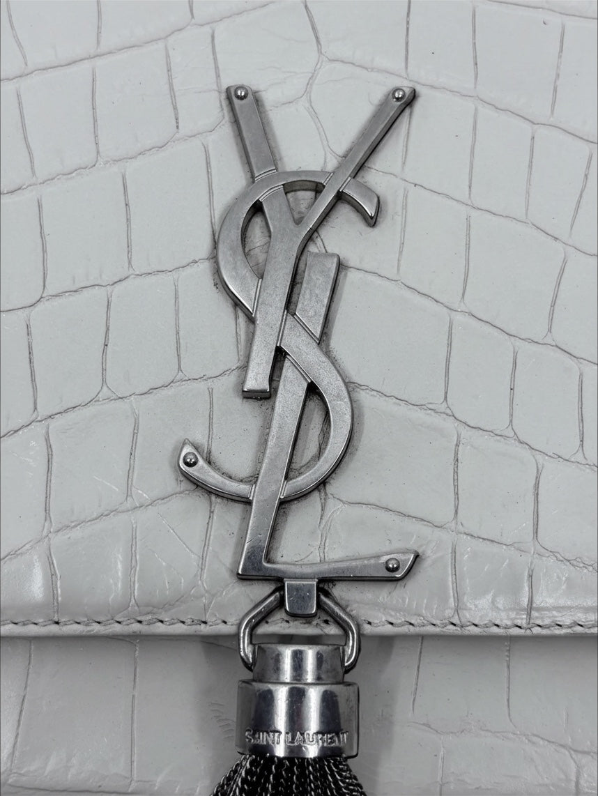 Posh Purse Co white crocodile-embossed leather YSL Kate bag featuring the iconic silver Cassandre logo hardware