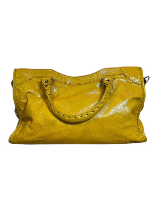 Posh Purse Co. yellow Balenciaga Agneau City Bag made of soft lambskin leather with braided handles and edgy hardware.