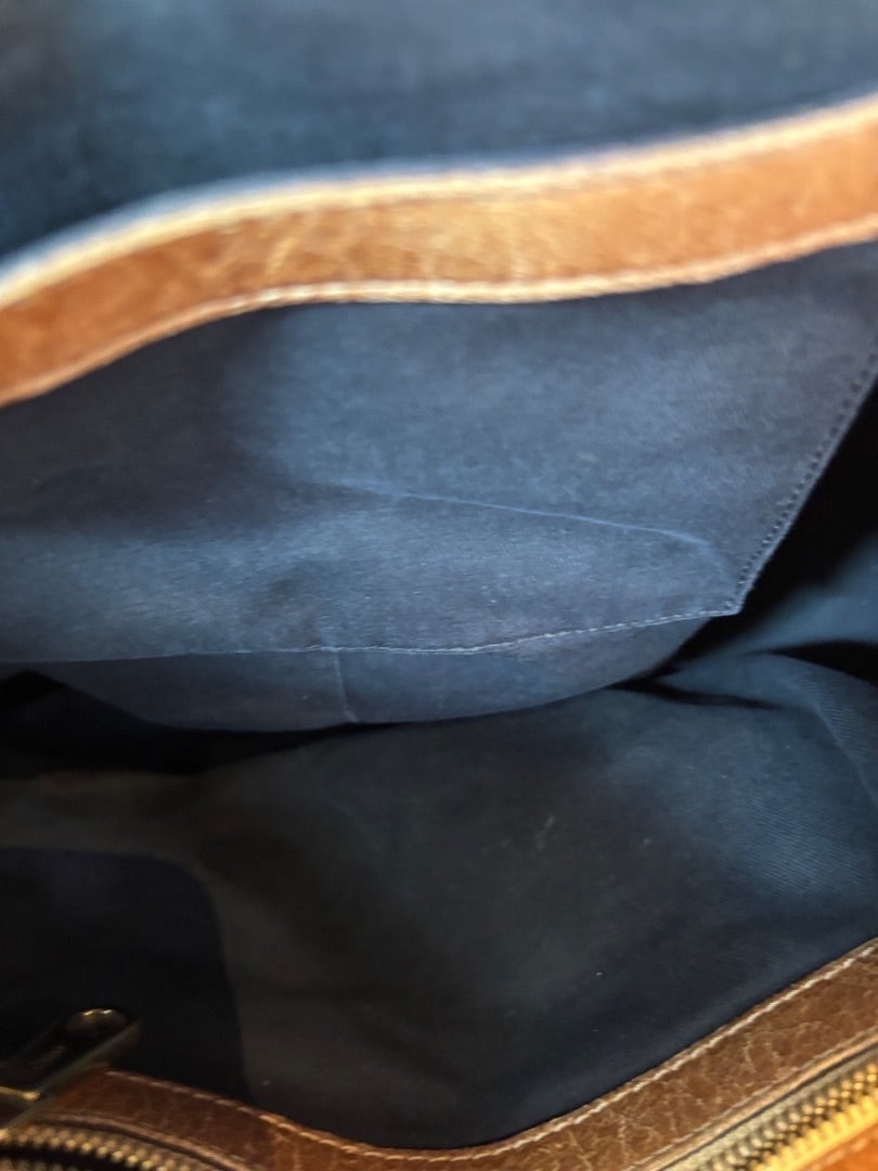 Posh Purse Co Chloé gold leather satchel bag interior with navy lining and tan leather trim.