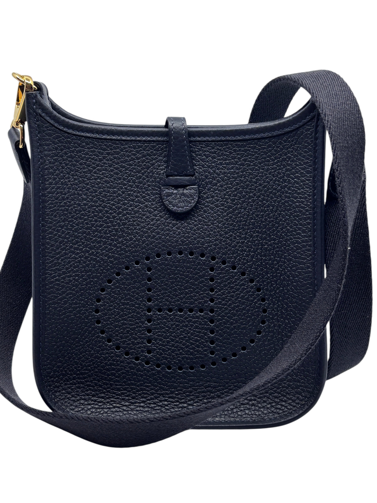Posh Purse Co. Hermès Evelyne TPM mini crossbody bag in dark blue leather with signature perforated H and gold hardware.