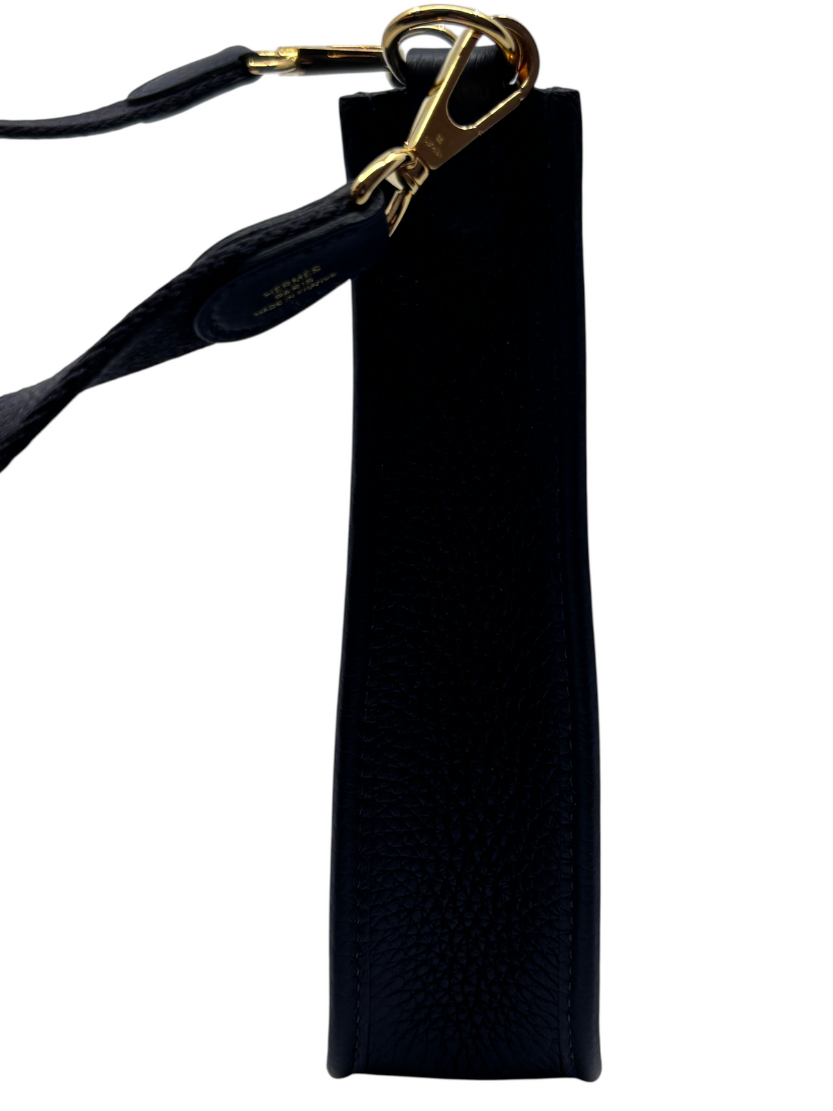 Posh Purse Co. Hermès Evelyne TPM black leather crossbody bag strap with gold-tone hardware detail.