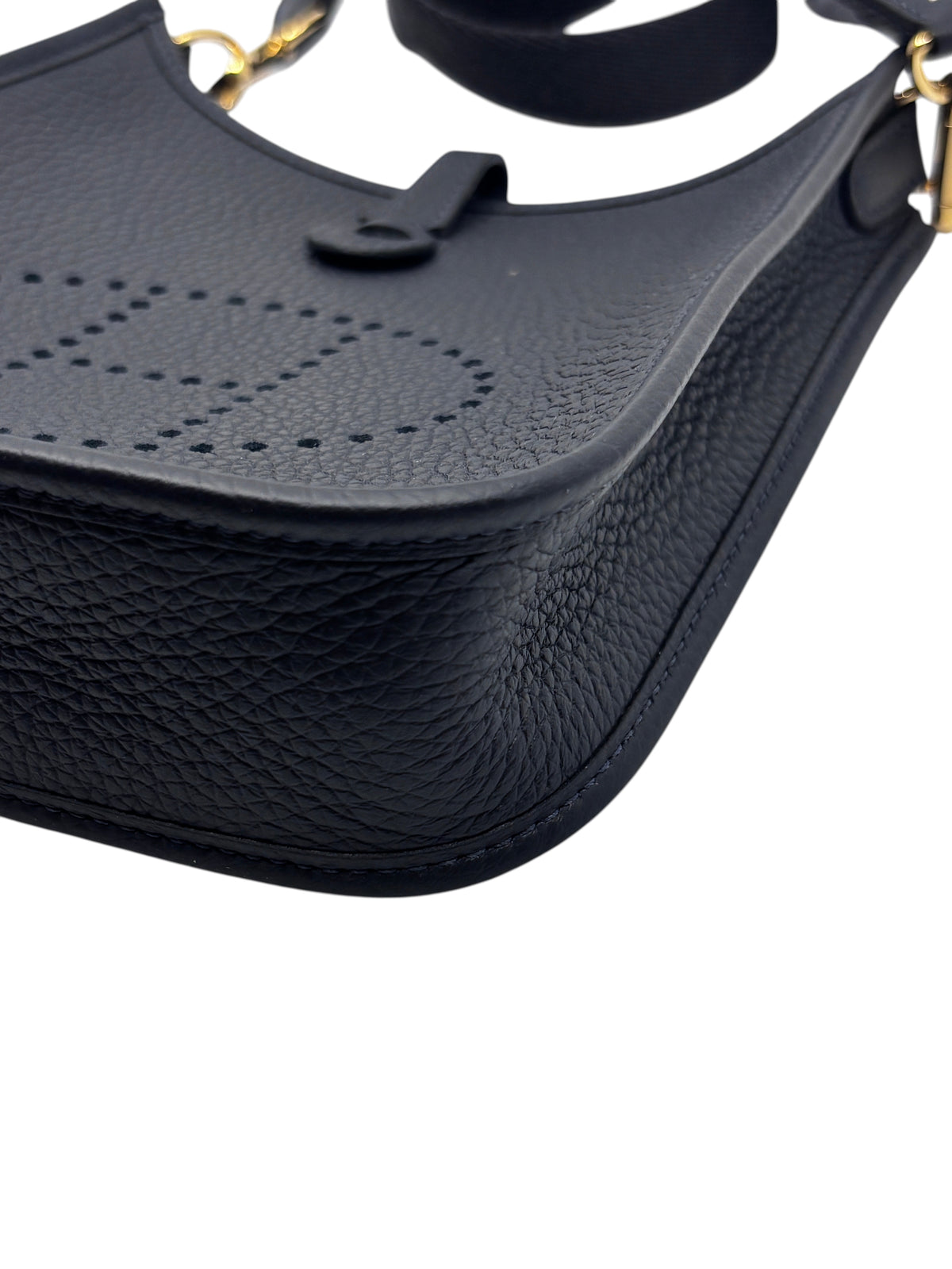 Posh Purse Co. Hermès Evelyne TPM mini crossbody bag in dark leather with signature perforated H and gold hardware.