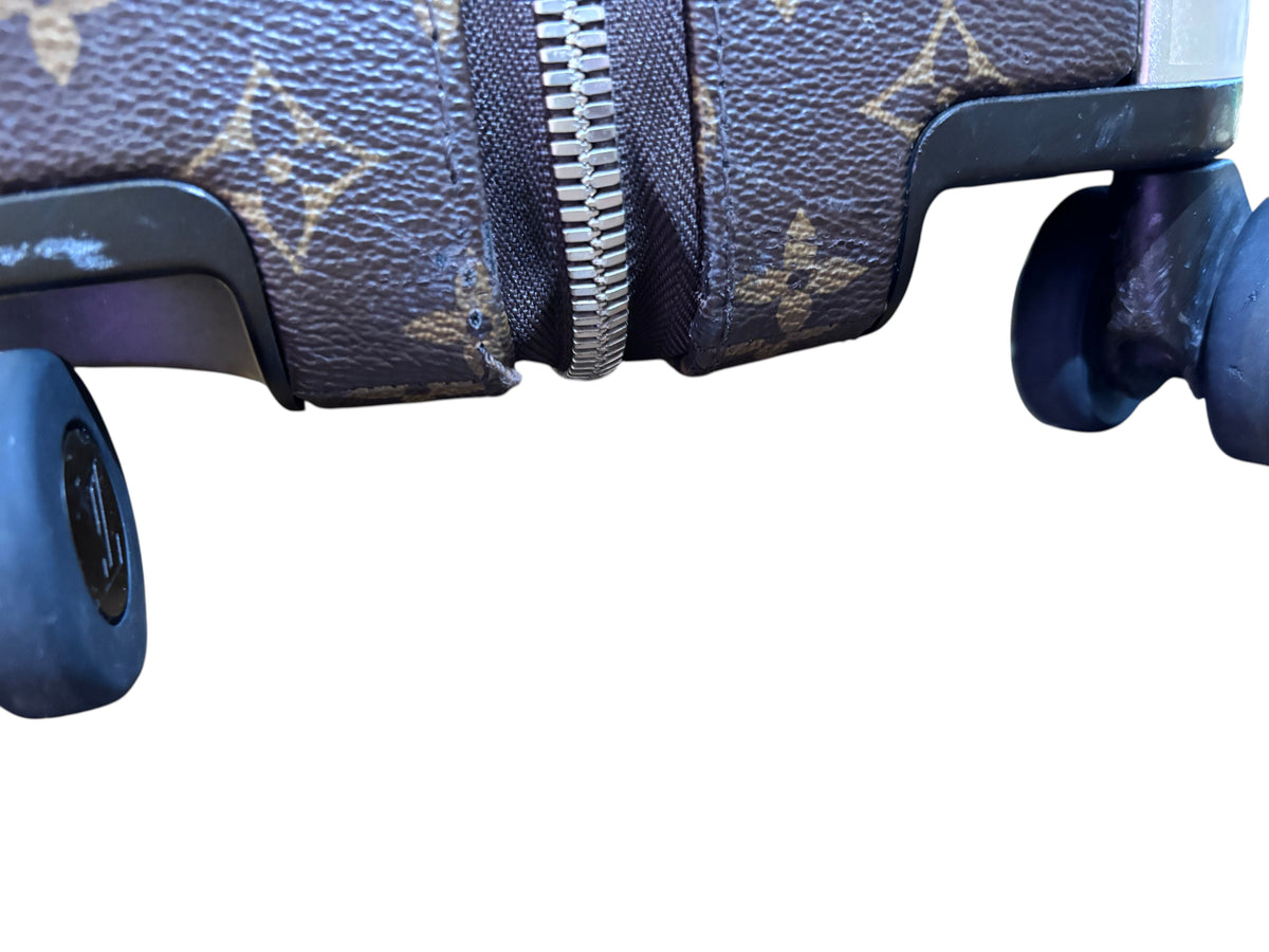 Posh Purse Co. Louis Vuitton Horizon 55 suitcase showing the brown monogram canvas, zipper, and rolling wheels.
