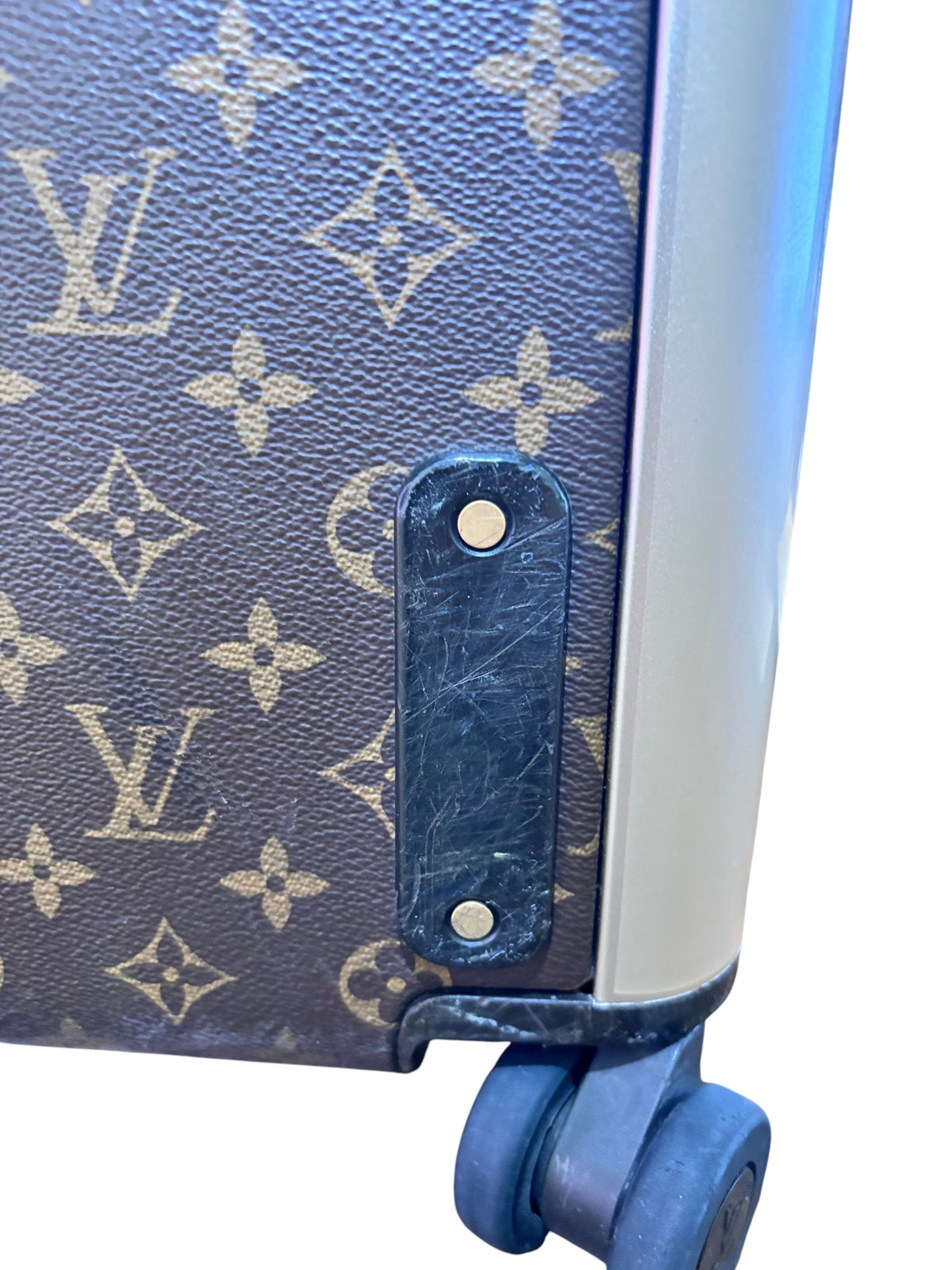 Posh Purse Co Louis Vuitton Horizon 55 suitcase featuring iconic brown monogram coated canvas and rolling wheel detail