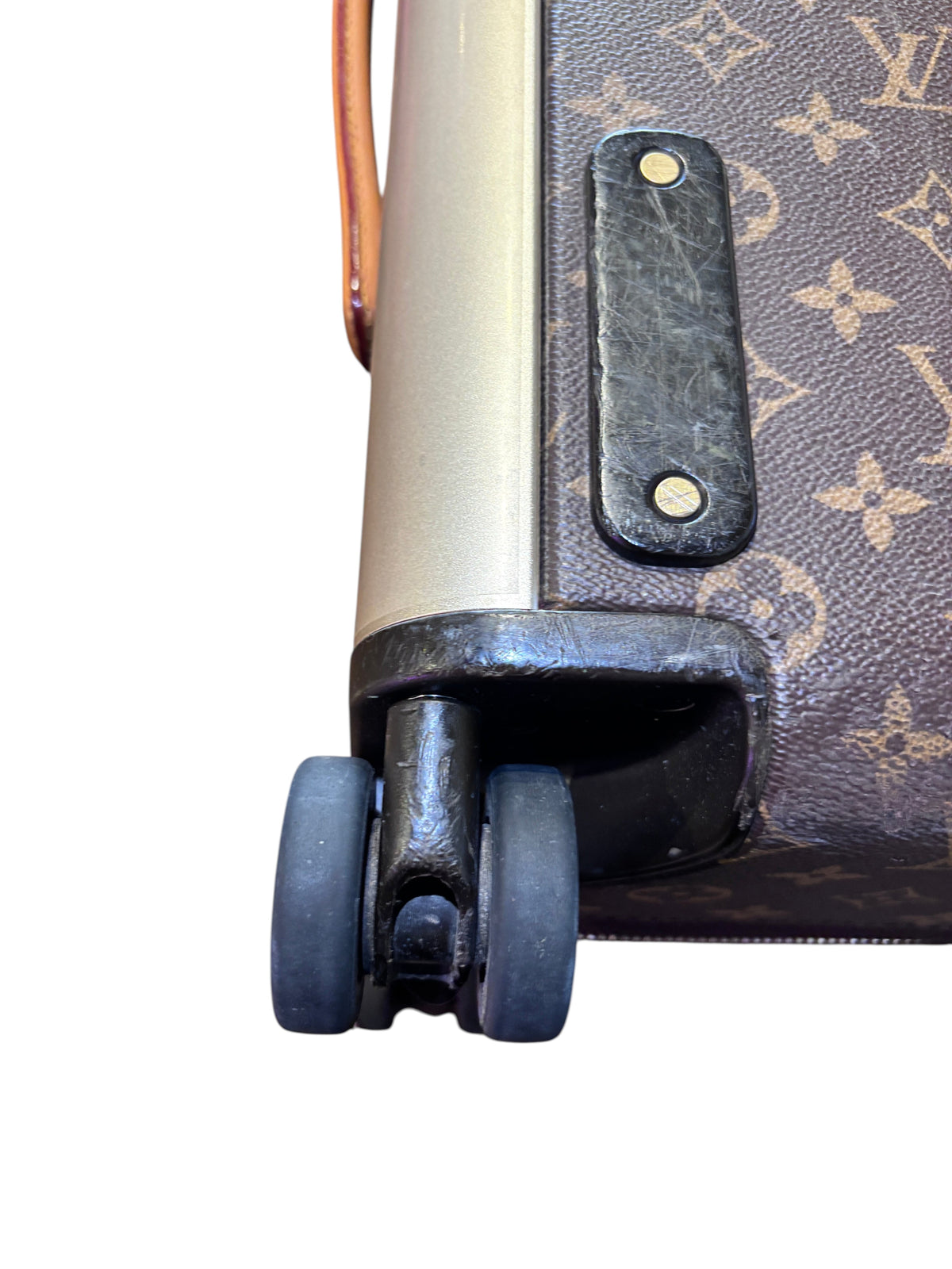 Posh Purse Co. Louis Vuitton Horizon 55 rolling suitcase wheel detail in iconic brown monogram coated canvas