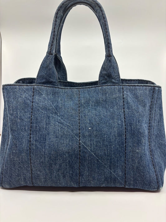 Posh Purse Co Avio blue denim tote bag with top handles and dark stitching detail.