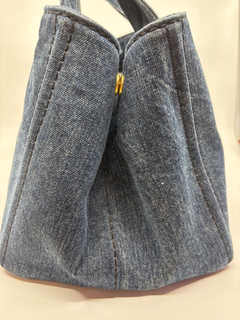 Posh Purse Co Avio blue denim tote bag with gold hardware and top handles. Casual luxury handbag.