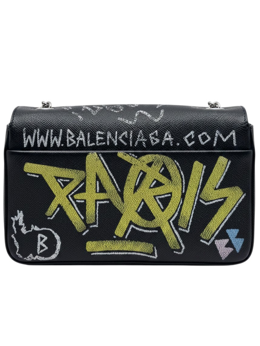 Posh Purse Co black Balenciaga wallet on chain with white and yellow graffiti print and silver hardware