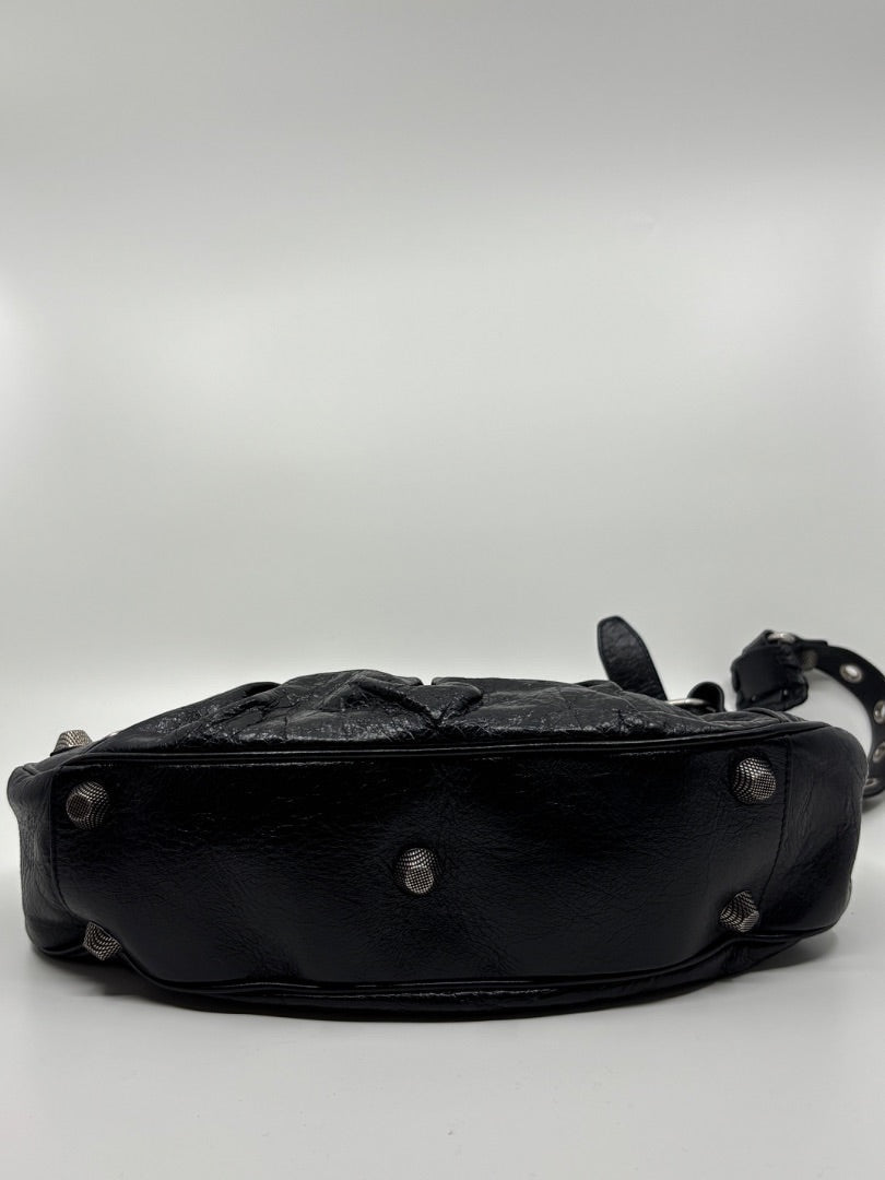 Posh Purse Co. black leather Balenciaga La Cagole shoulder bag with studded details and aged hardware.