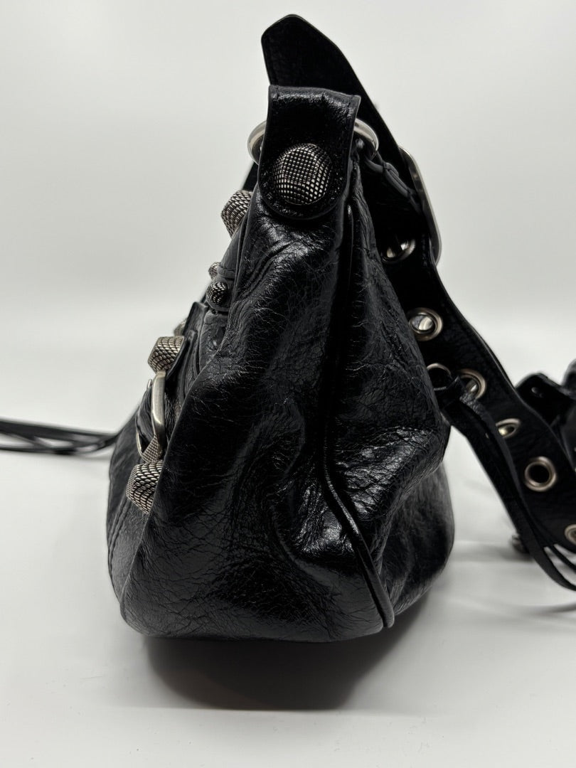 Posh Purse Co. Balenciaga La Cagole black leather shoulder bag with studded details and aged hardware.