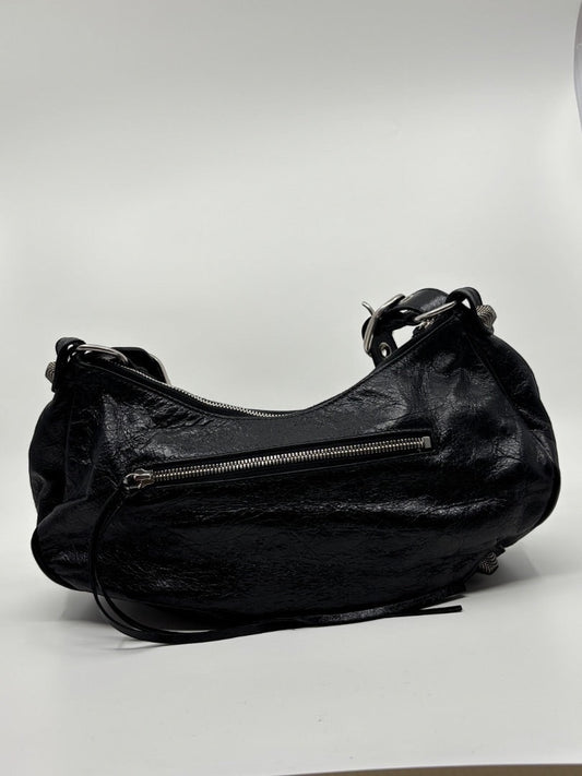 Posh Purse Co. Balenciaga La Cagole black leather shoulder bag with silver hardware and zip closure.