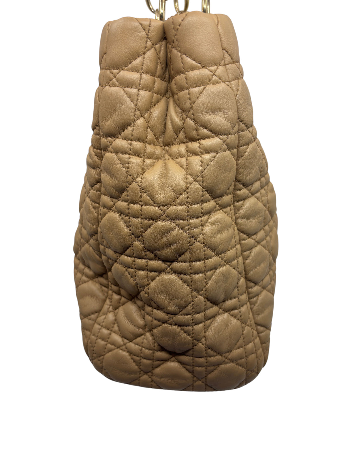 Posh Purse Co. beige Dior Cannage quilted leather tote bag side view showing signature stitching and chain hardware