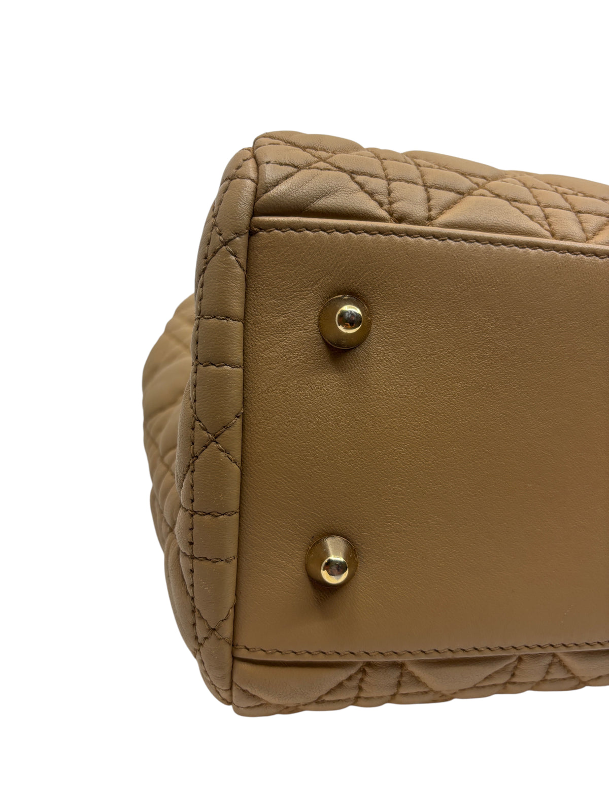 Posh Purse Co beige Dior Cannage tote bag base showing quilted leather texture and polished gold protective feet