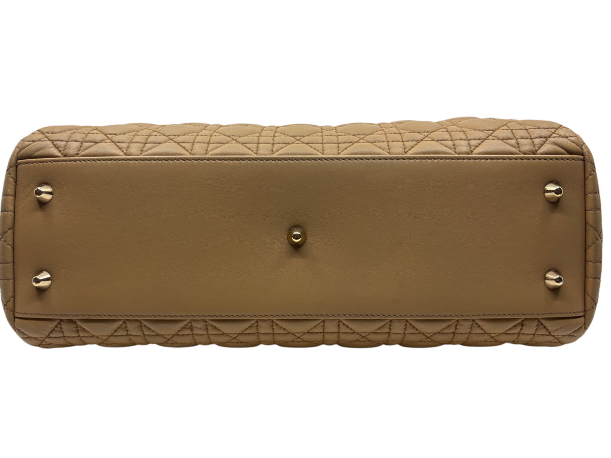 Posh Purse Co. beige Dior Cannage chain tote bag showing the flat base with protective metal feet