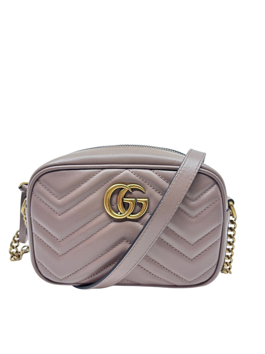 Posh Purse Co. beige Gucci Marmont camera bag with chevron quilting, gold GG logo, and chain shoulder strap.
