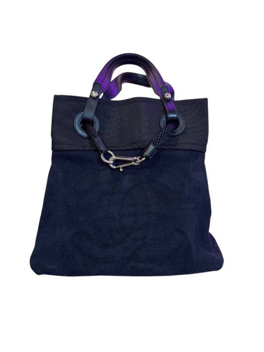 Posh Purse Co. black and blue Chanel XXL beach tote with leather handles and iconic CC logo stitching. Features rope detail and silver hardware.