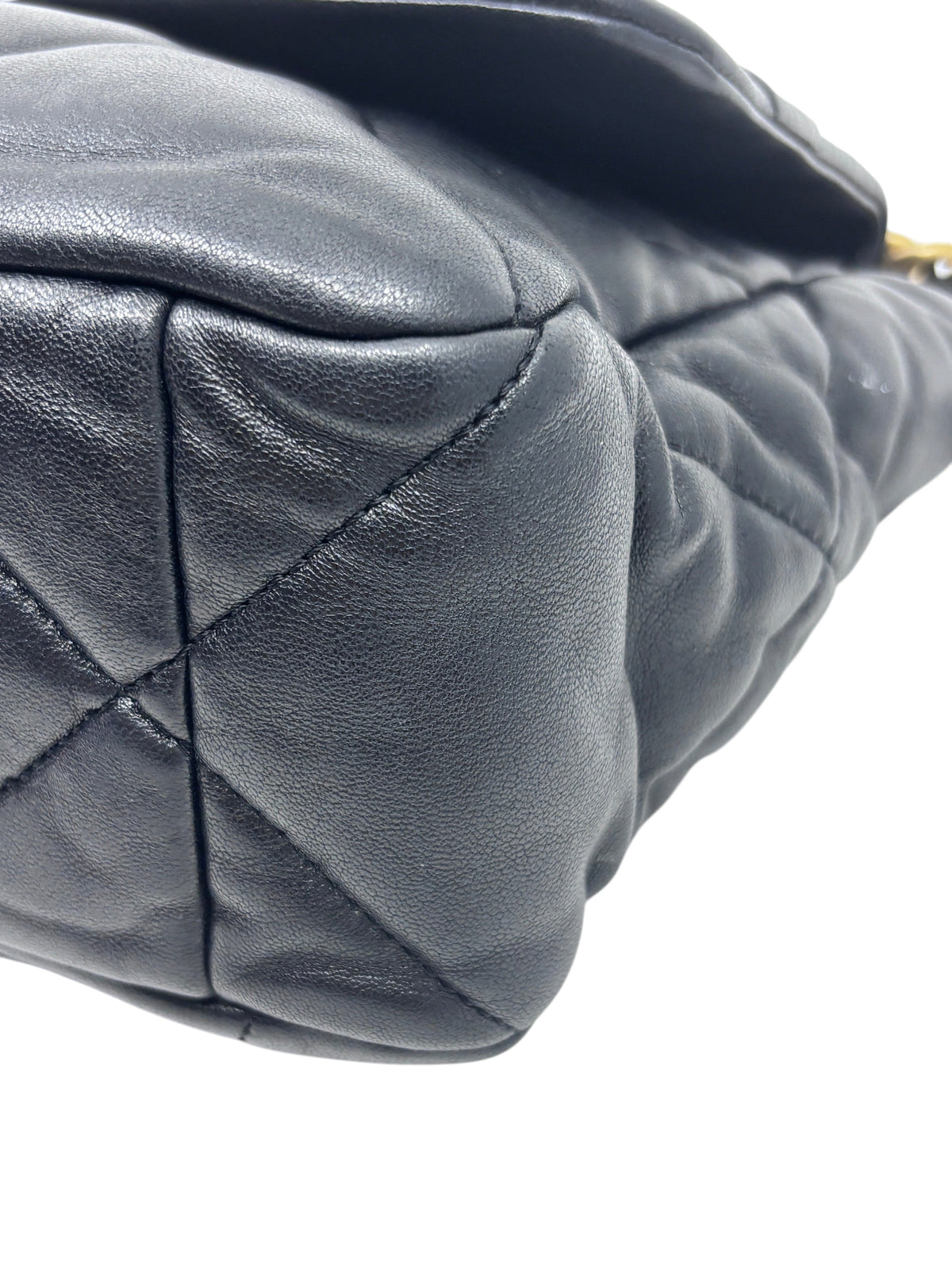 Posh Purse Co black Chanel 19 Flap bag featuring oversized diamond quilting and soft leather construction.