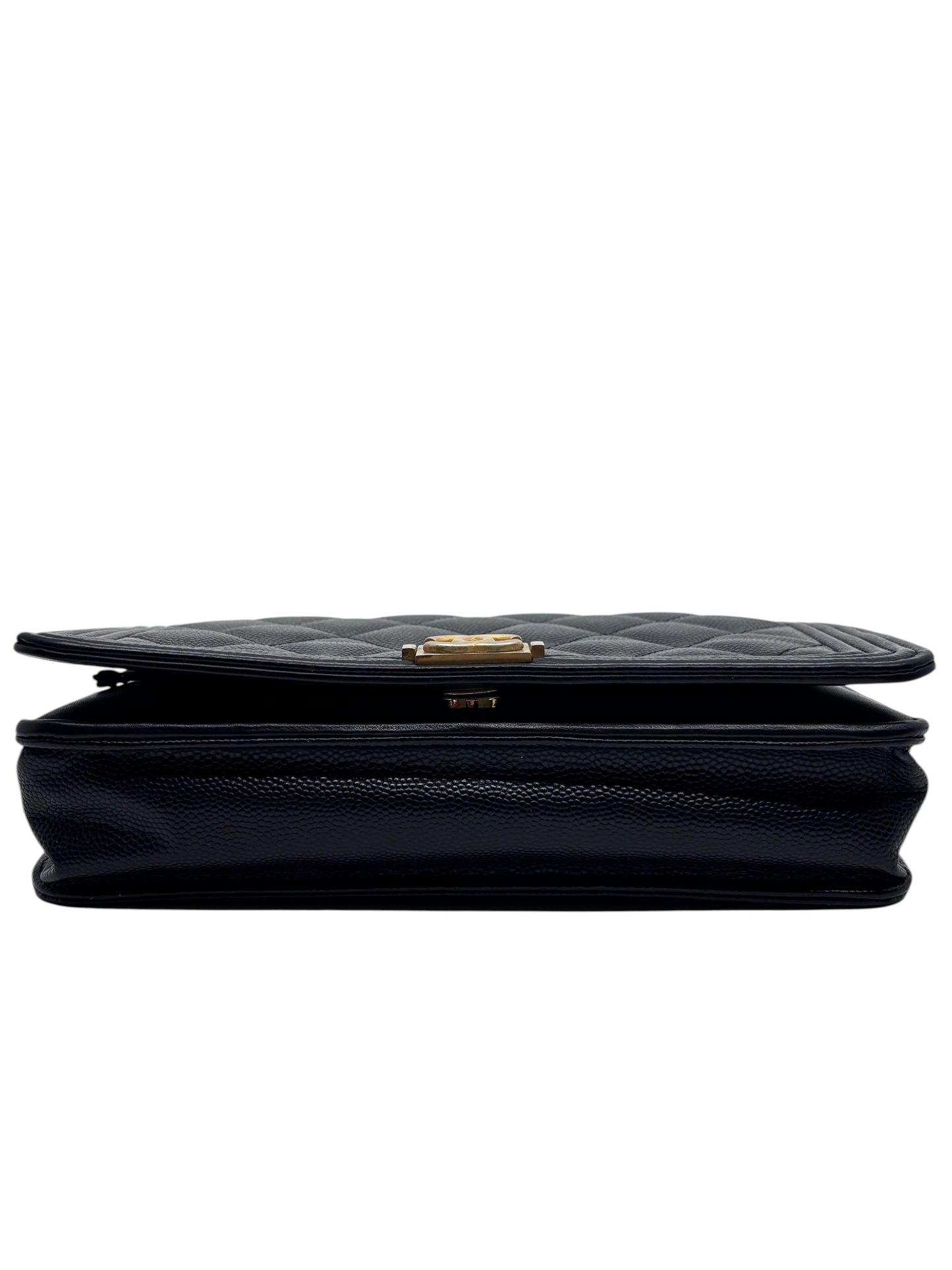 Posh Purse Co black Chanel Boy Wallet on Chain with quilted leather and gold hardware, viewed from the side.
