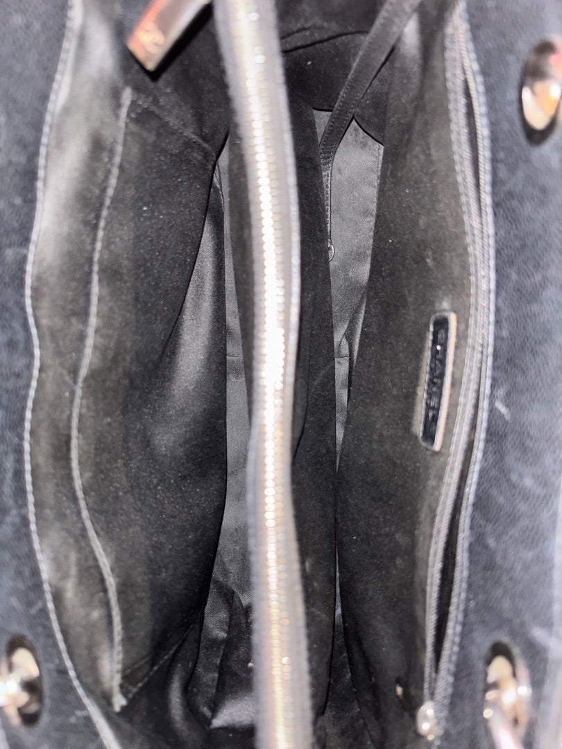 Posh Purse Co black Chanel Grand Shopping Tote interior with caviar leather, silver-tone hardware, and multiple compartments.