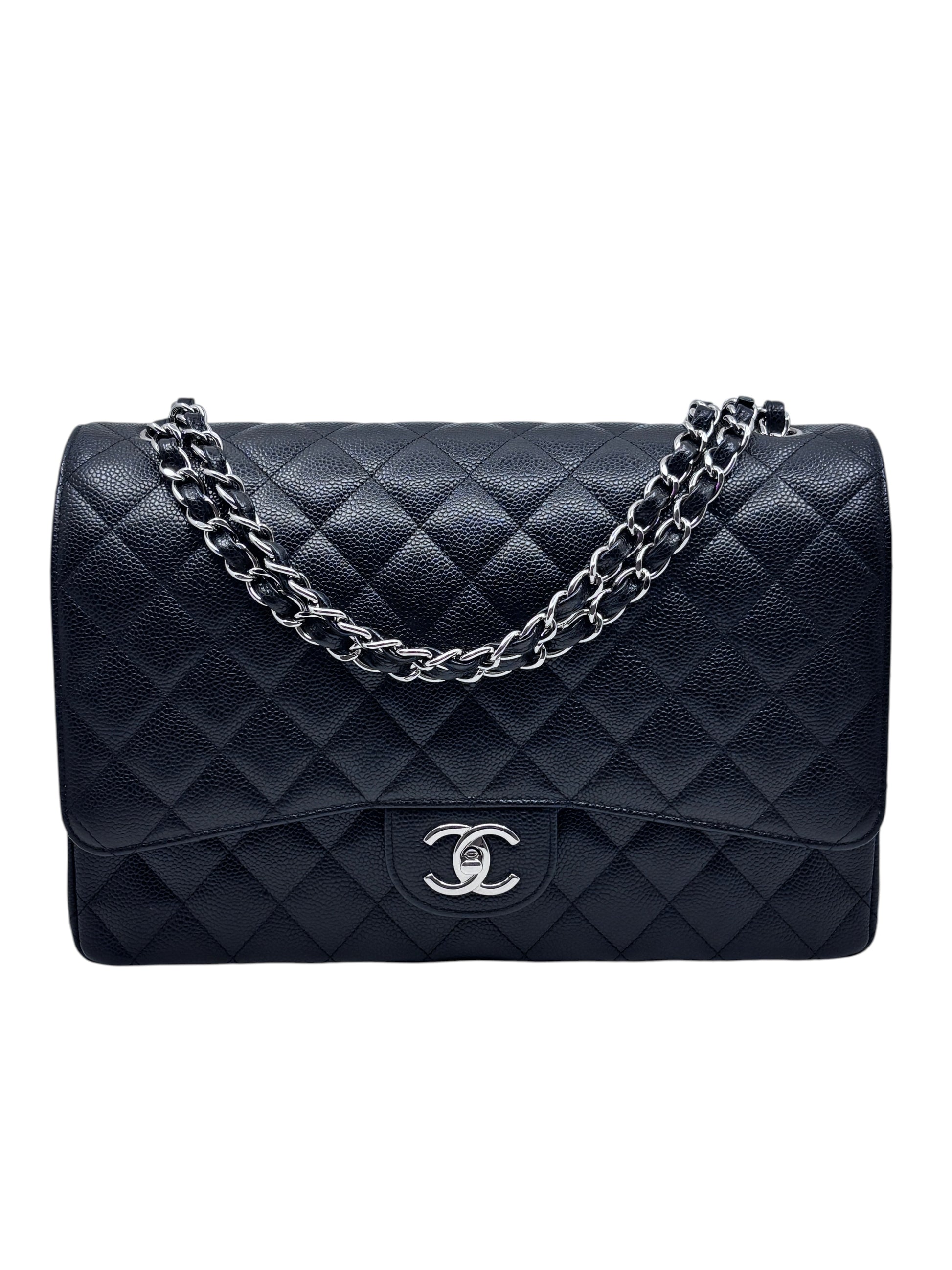 Posh Purse Co black Chanel Classic Jumbo Flap bag in quilted caviar leather with silver CC turn-lock and chain strap.