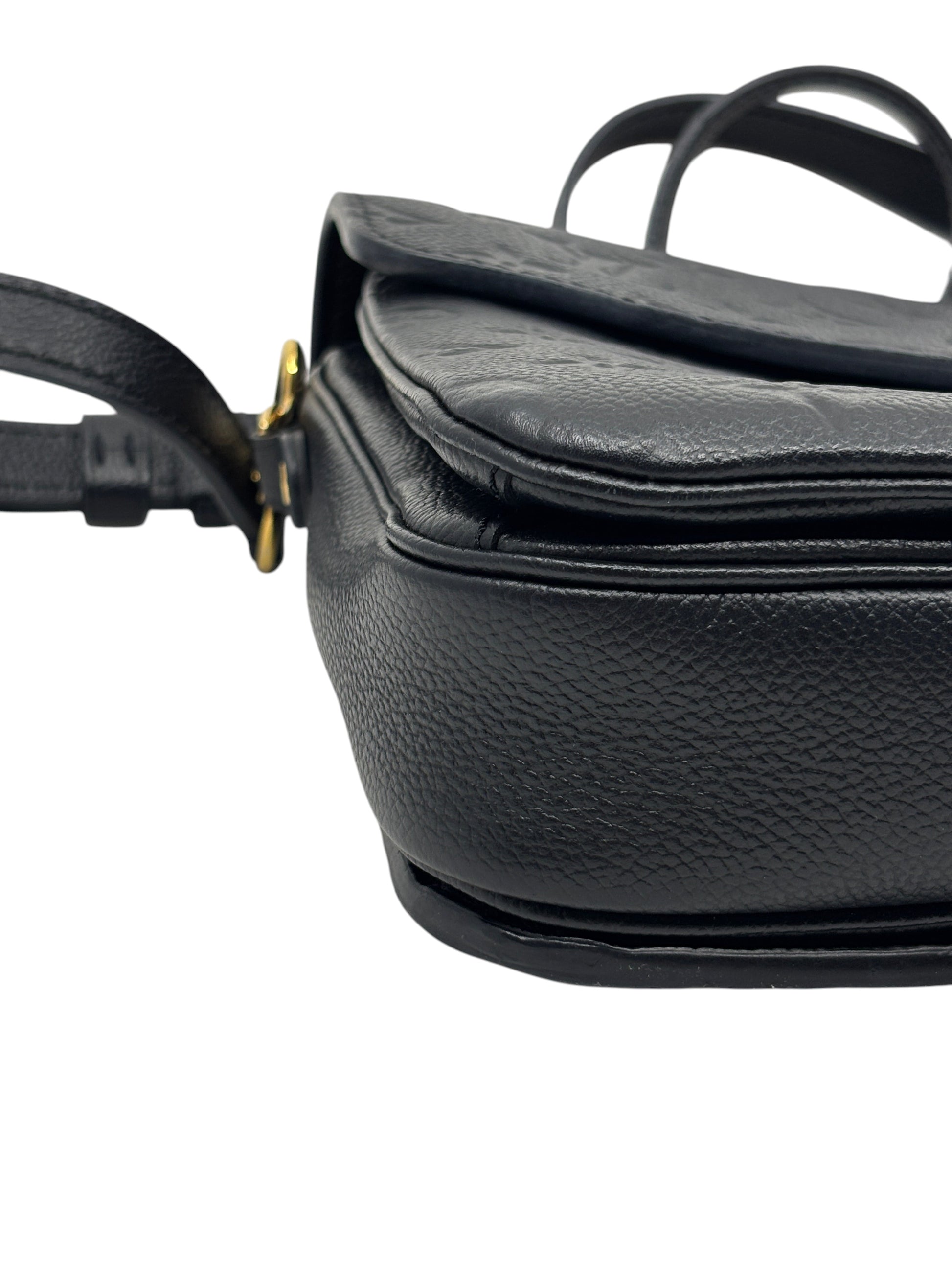 Posh Purse Co. black Louis Vuitton Empreinte Pochette Metis handbag featuring embossed leather and gold hardware.