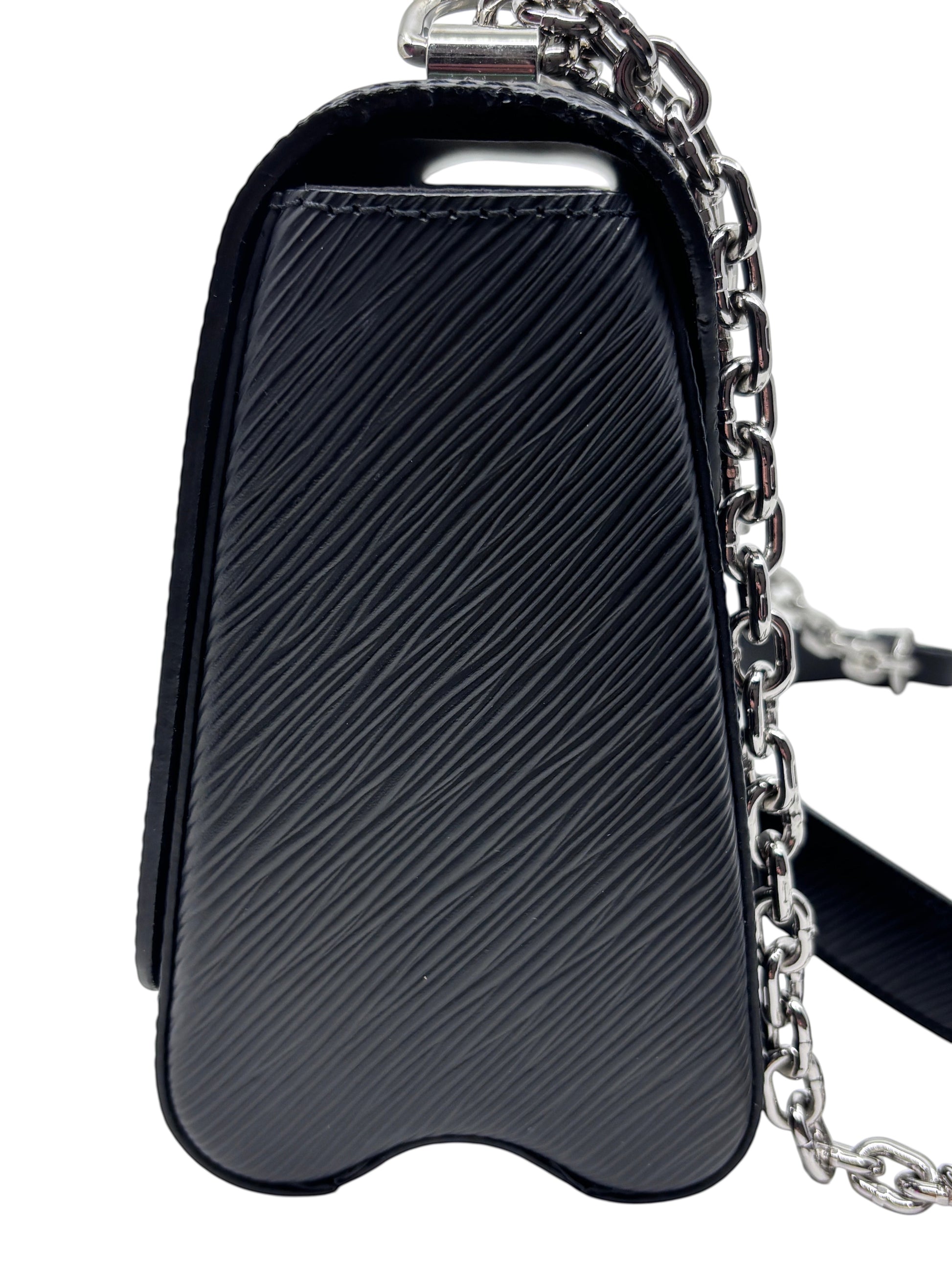 Posh Purse Co black Louis Vuitton Epi leather Twist bag side view with silver chain strap and textured finish
