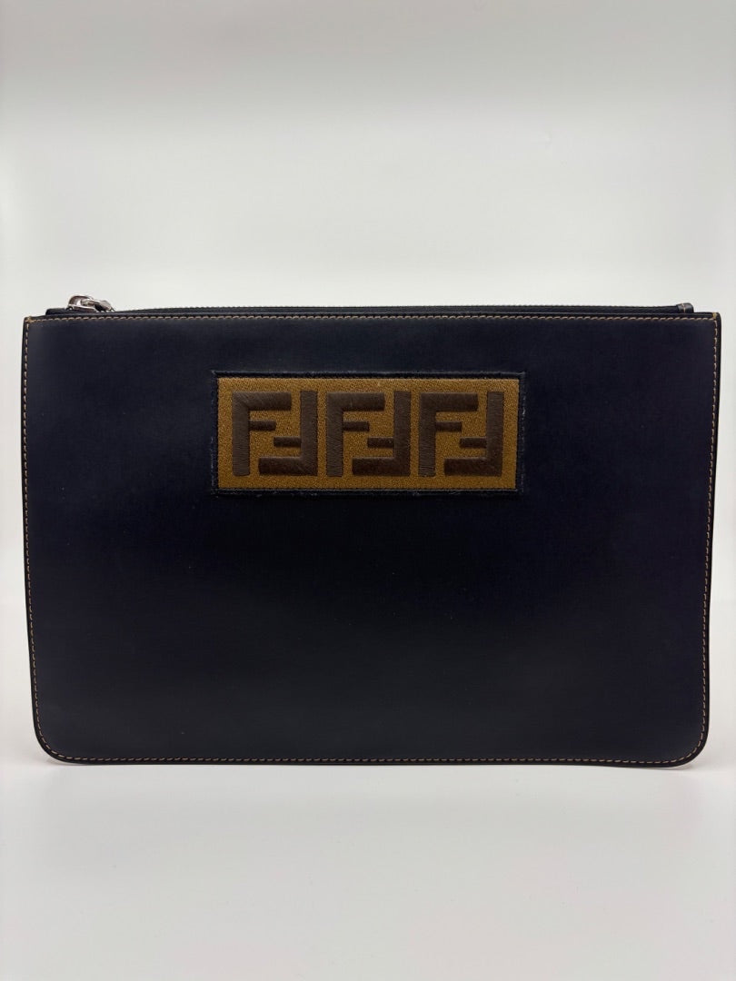 Posh Purse Co black leather Fendi pouch with iconic FF logo patch. Zipper closure, ideal for clutch or tote organizer.