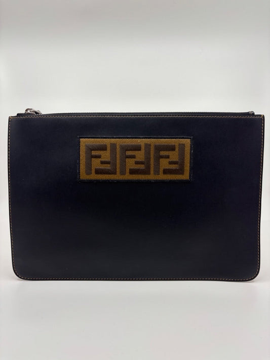 Posh Purse Co black leather Fendi pouch with iconic FF logo patch. Zipper closure, ideal for clutch or tote organizer.