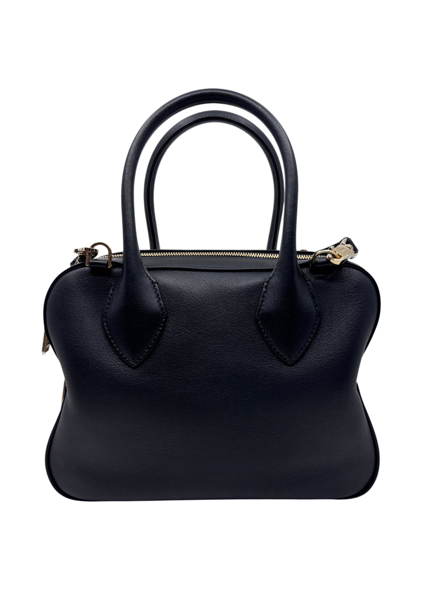 Posh Purse Co. black Ferragamo triple zip handbag with structured silhouette and gold-tone hardware