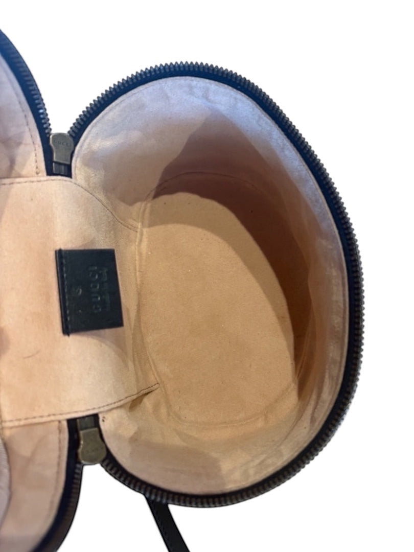 Posh Purse Co black Gucci GG Marmont mini backpack interior, showing suede-like lining and zip closure.