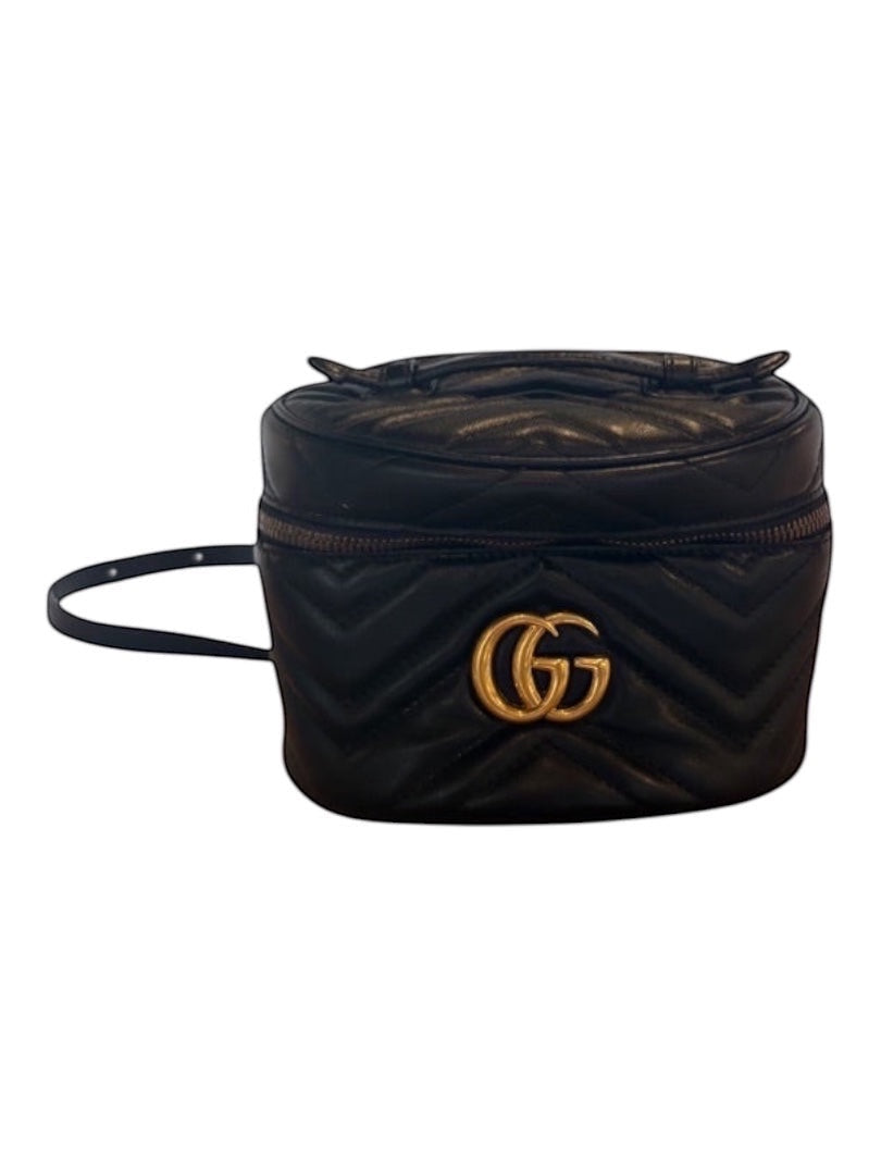 Posh Purse Co black Gucci GG Marmont mini backpack in matelassé chevron leather with antique gold GG logo.