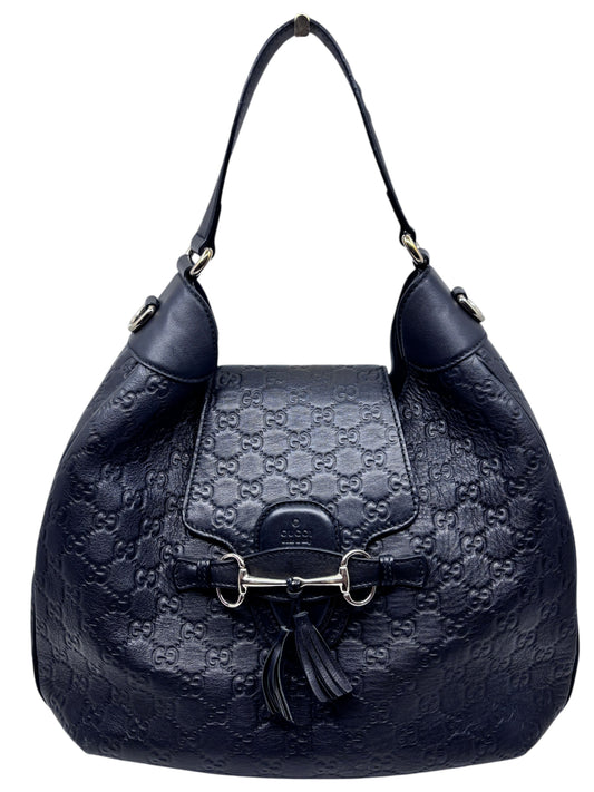 Posh Purse Co. black Gucci Horsebit 1955 hobo bag in embossed leather with silver-tone hardware and tassel detail.