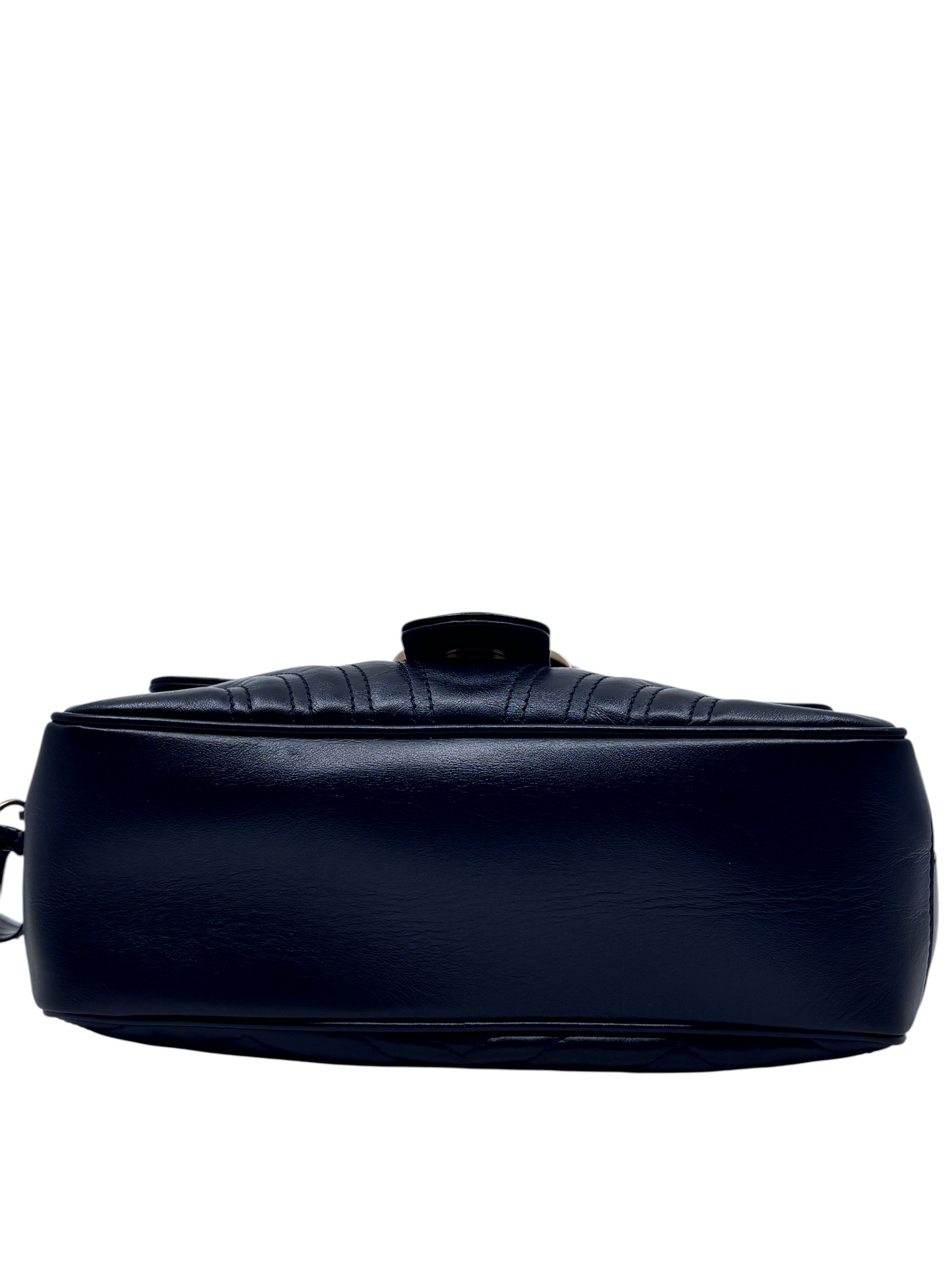 Posh Purse Co black leather Gucci Marmont crossbody bag viewed from the bottom showing smooth leather construction