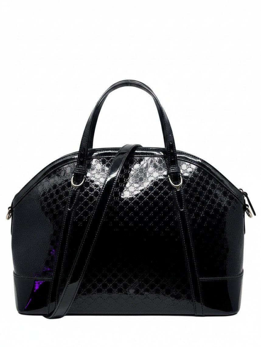 Posh Purse Co black Gucci Micro Guccissima leather top handle bag with iconic embossed GG pattern