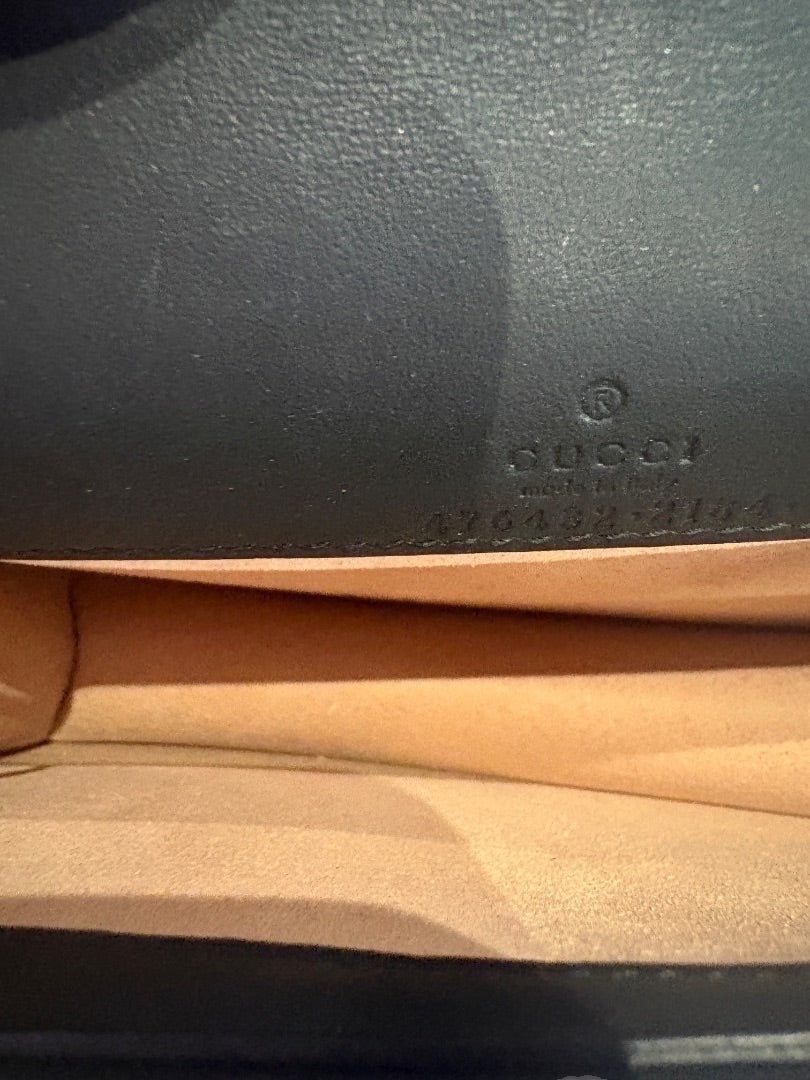 Posh Purse Co. black velvet Gucci Mini Dionysus bag interior showing brand stamp and serial number.