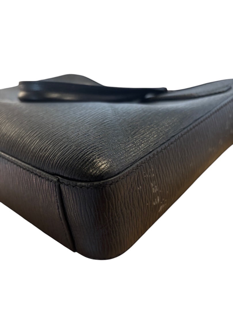 Posh Purse Co black leather Mancini Revival briefcase with structured silhouette and top handles.
