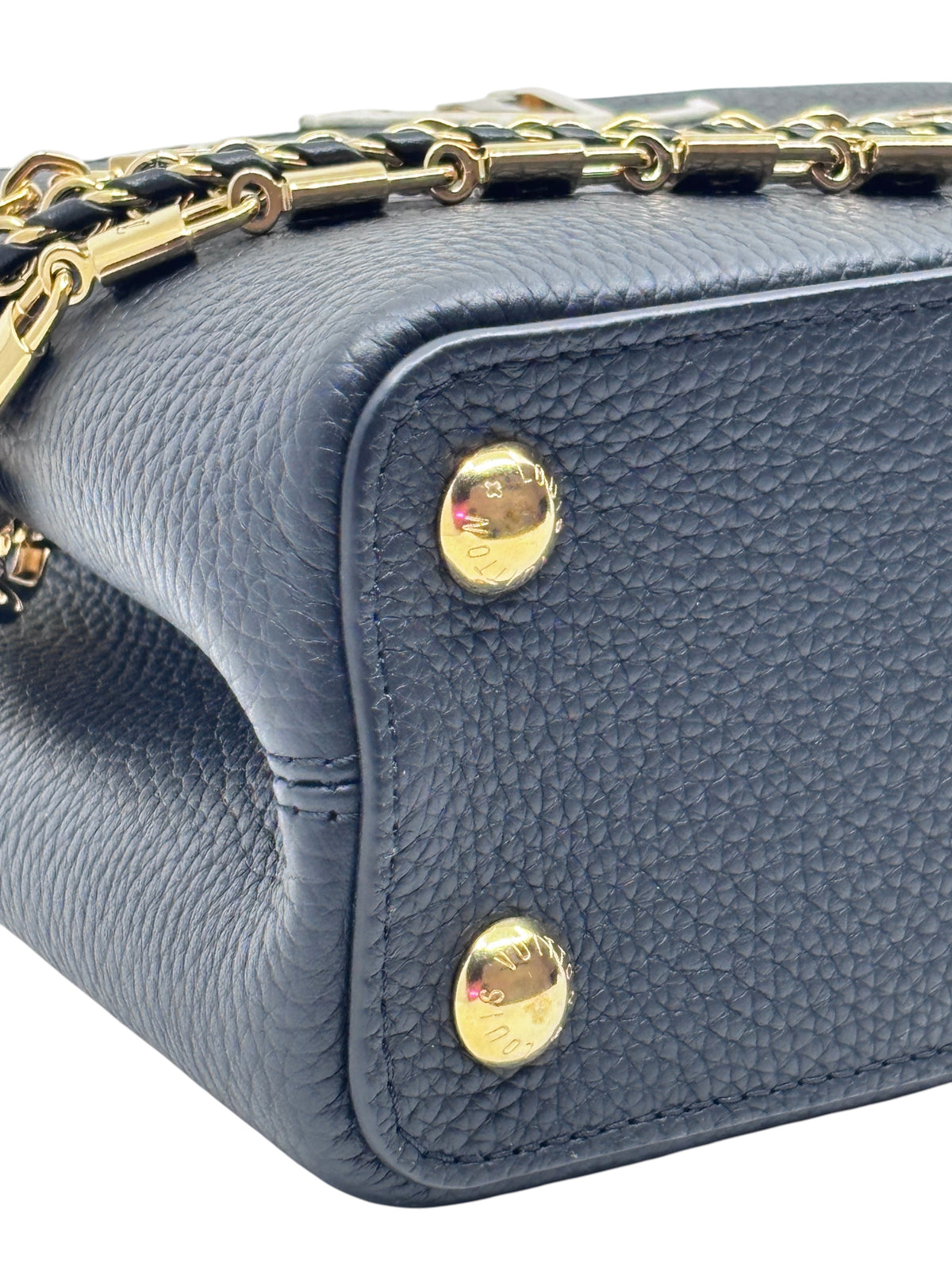 Posh Purse Co black leather Louis Vuitton Capucines BB handbag showing gold protective feet and chain strap detail