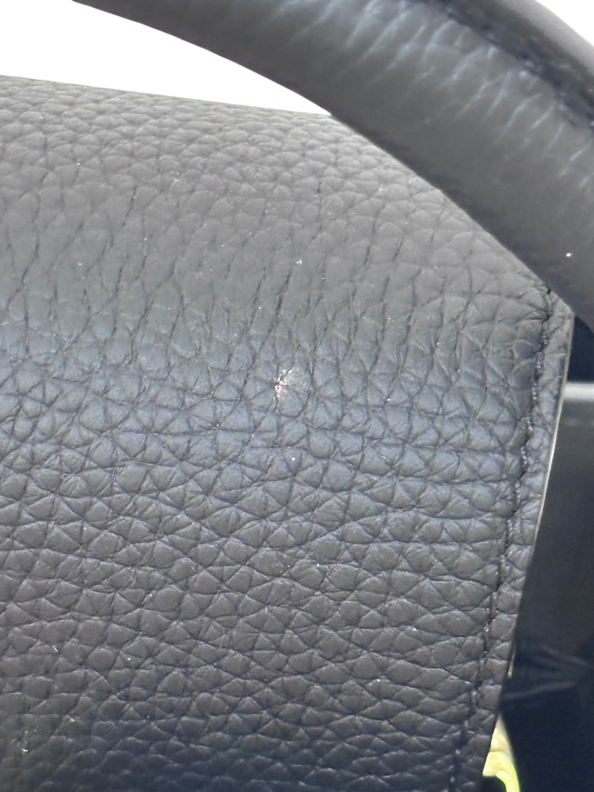 Posh Purse Co black pebbled leather texture detail on a Louis Vuitton Capucines BB handbag
