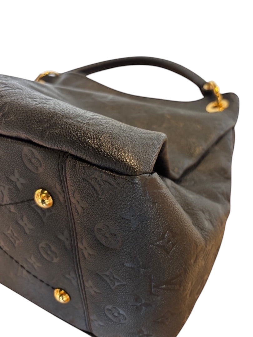 Posh Purse Co black Louis Vuitton Artsy MM hobo bag in embossed leather with gold-tone hardware and braided handle.