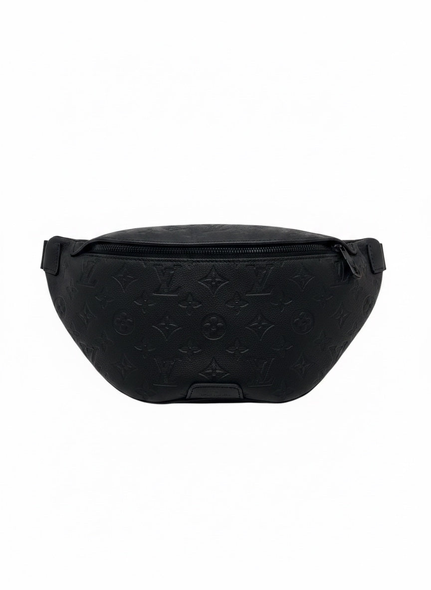 Posh Purse Co. black Louis Vuitton Empreinte leather bumbag with embossed monogram pattern and zipper closure.