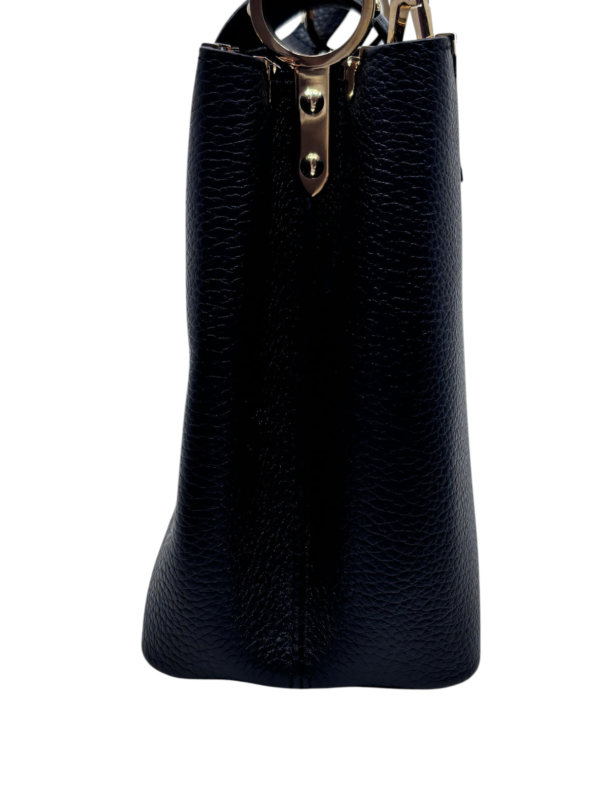 Side view of a black Posh Purse Co Louis Vuitton Flower Crown Capucines MM handbag with textured leather and hardware.